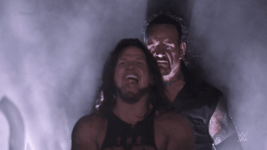 AJ Styles Undertaker Behind
