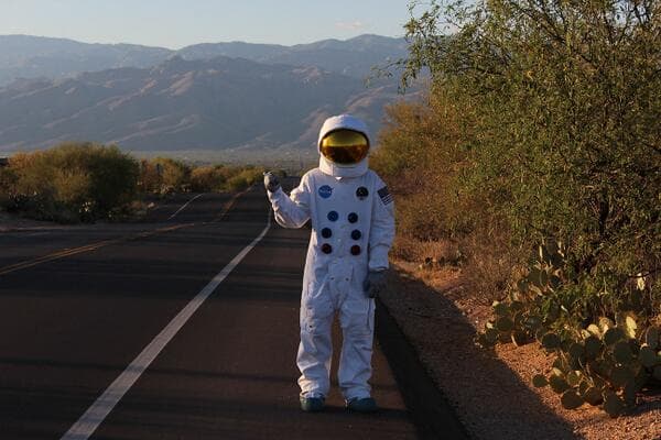 NASA Astronaught Hitchhiker meme template image.