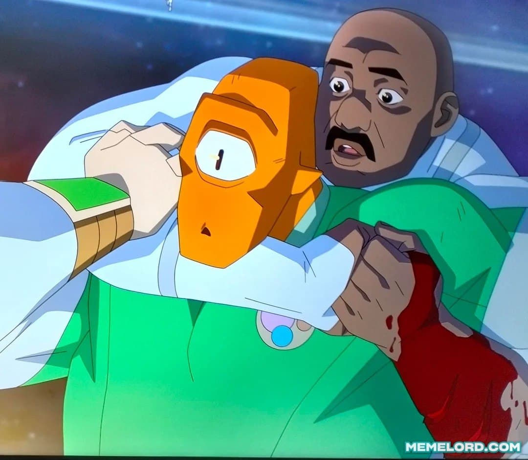 An animated orange-masked alien in a green suit lies in the foreground while a bald bearded man behind him stares wide-eyed with his mouth open; both appear shocked. A visible MEMELORD.COM watermark is at the lower right.