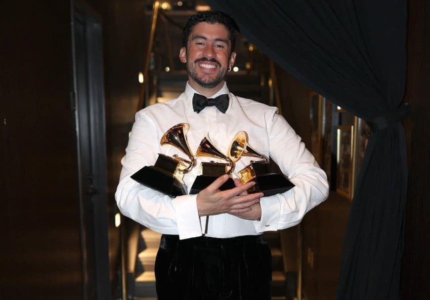 Bad Bunny Holding Three Grammys