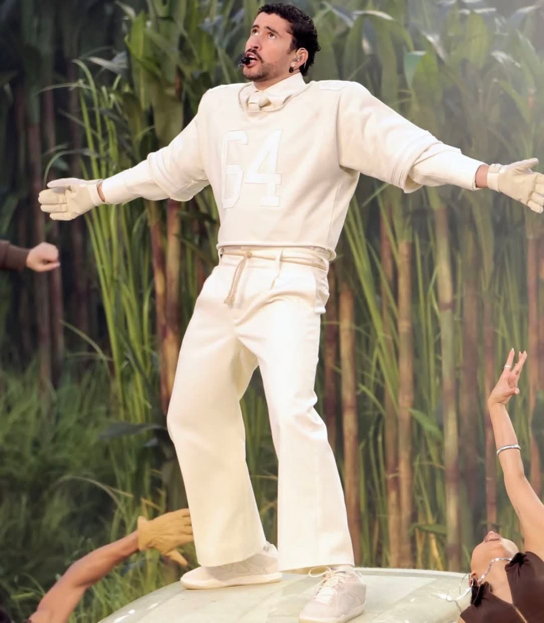 Bad Bunny Performing With Arms Out