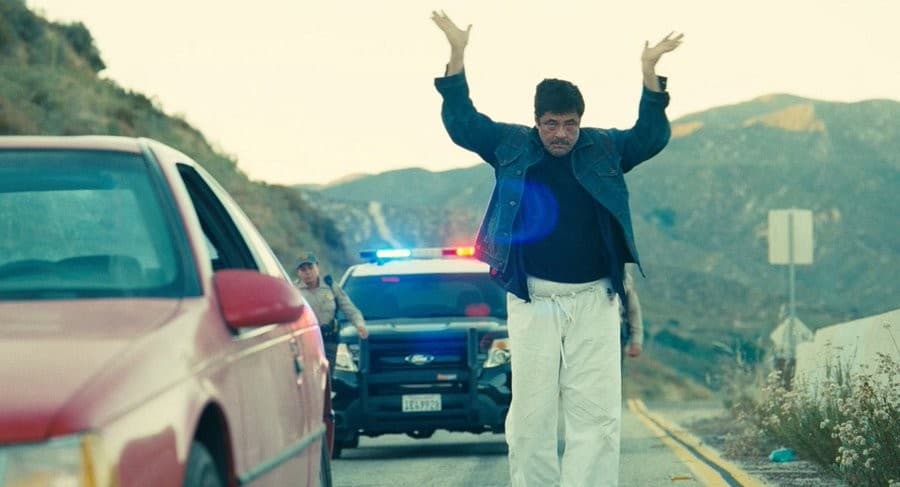 Benicio Del Toro Hands-Up Road Scene