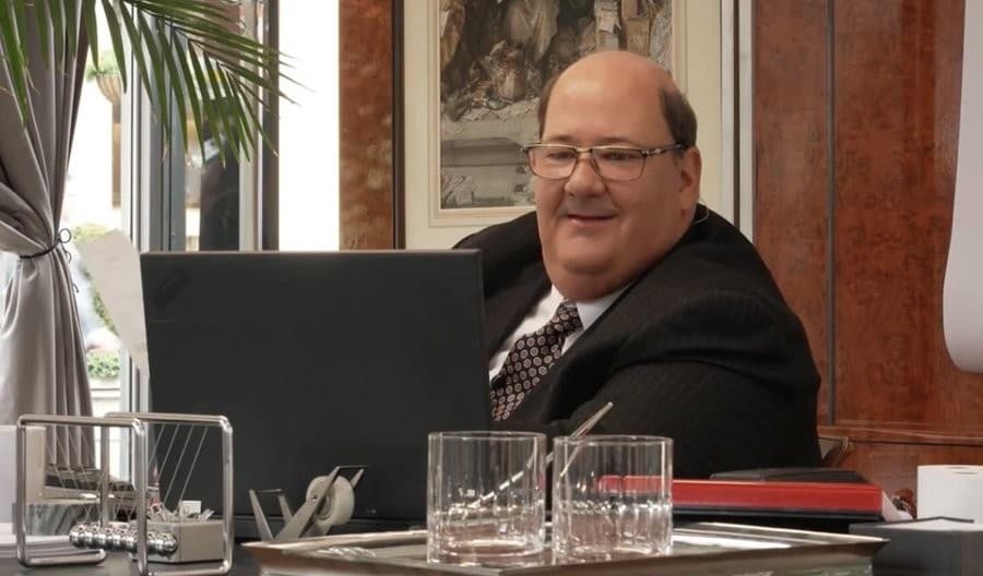 Kevin Malone Looking At Laptop