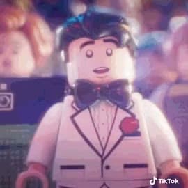 Blocky Tuxedo Character With Rose
