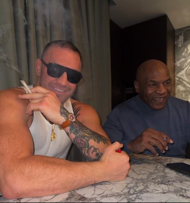 Conor McGregor and Mike Tyson smoking