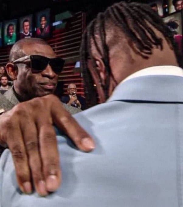 Deion Sanders Hand On Shoulder bro to bro advice