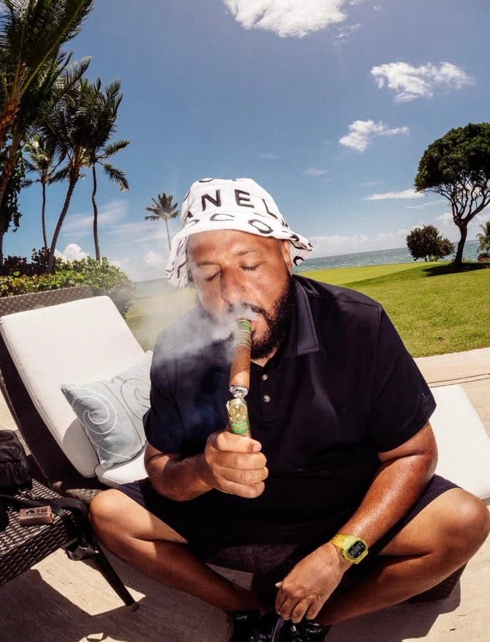 DJ Khaled smoking a cigar