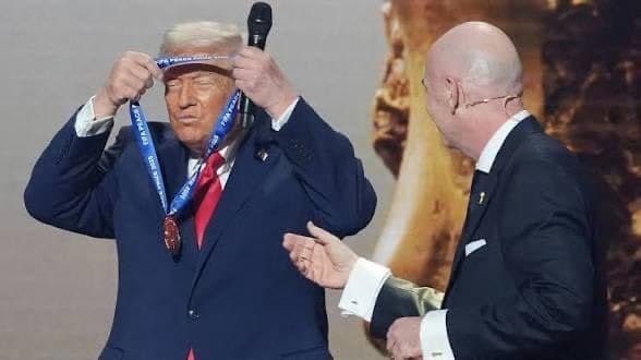 Donald Trump self putting on an award