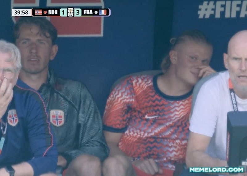 Erling Haaland smiling on the bench - FIFA World Cup meme template