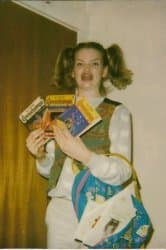 A young girl with pigtails and braces holding three Goosebumps books with an exaggerated excited expression, captioned with misspelled 'Ermahgerd' text