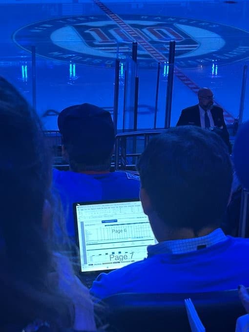 Guy working on a laptop during a New York Rangers game Meme Template