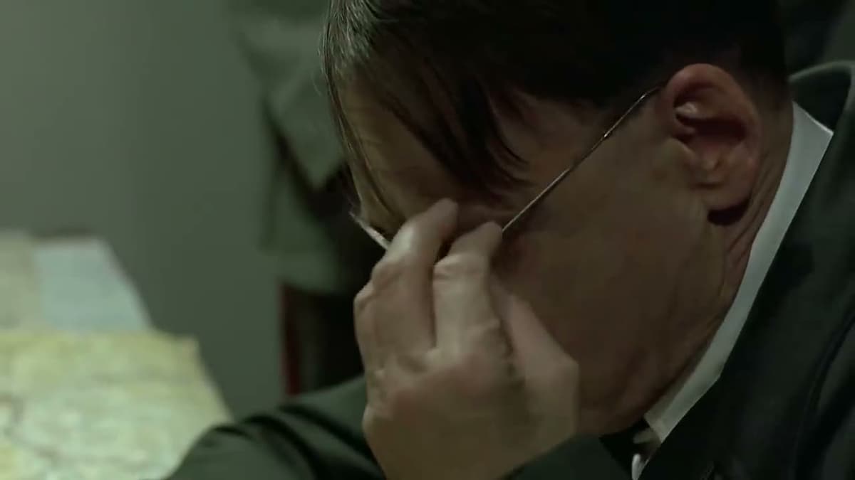 Hitler Taking Off Glasses