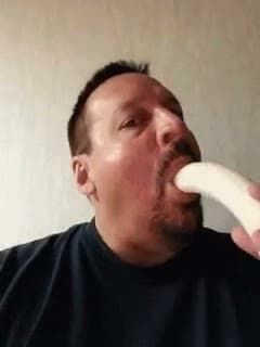 Man Biting Banana
