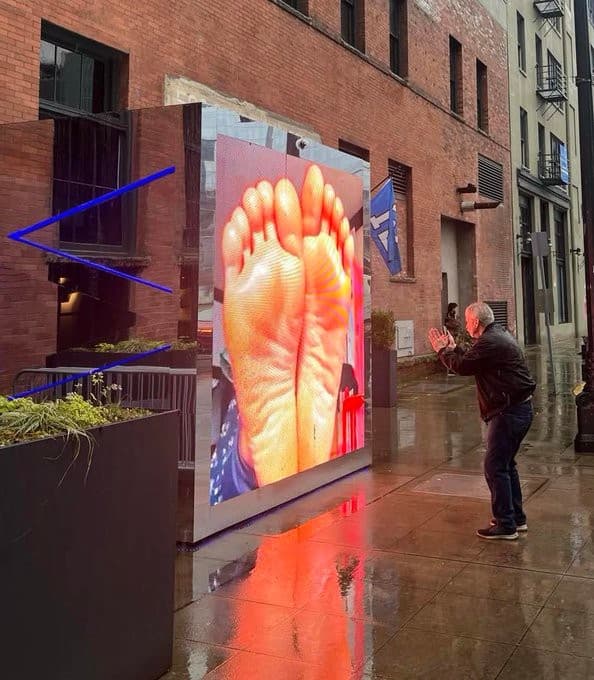 Polymarket portal feet video on the screen