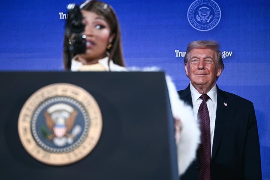 President Trump looking at Nicki Minaj speaking Meme Template