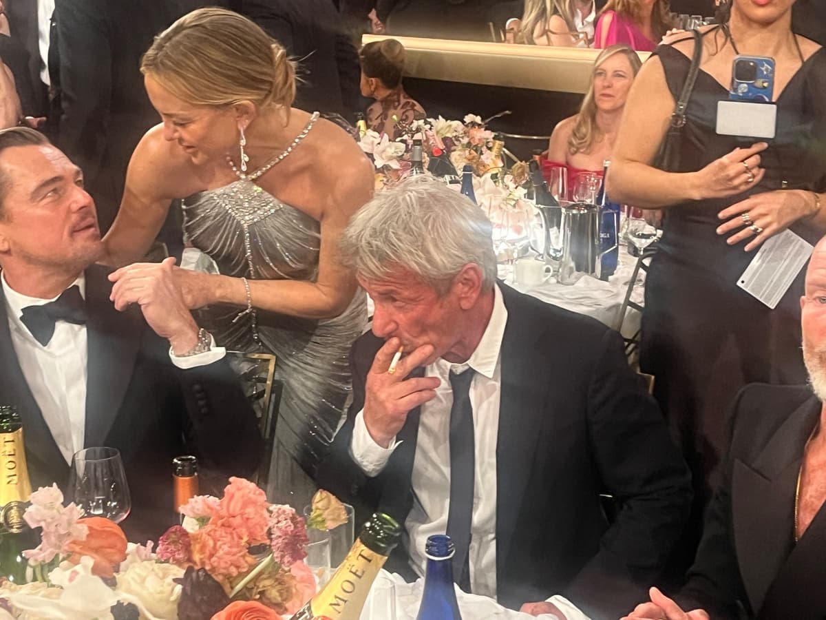 Sean Penn smoking indoors at the 2026 Golden Globes dinner Meme Template
