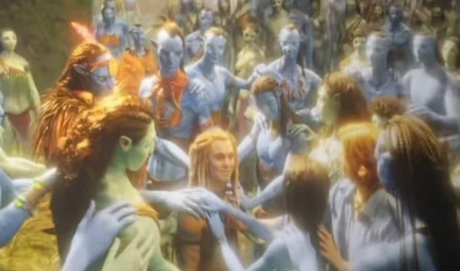 Spider surrounded by Na'vi "Avatar: Fire and Ash"