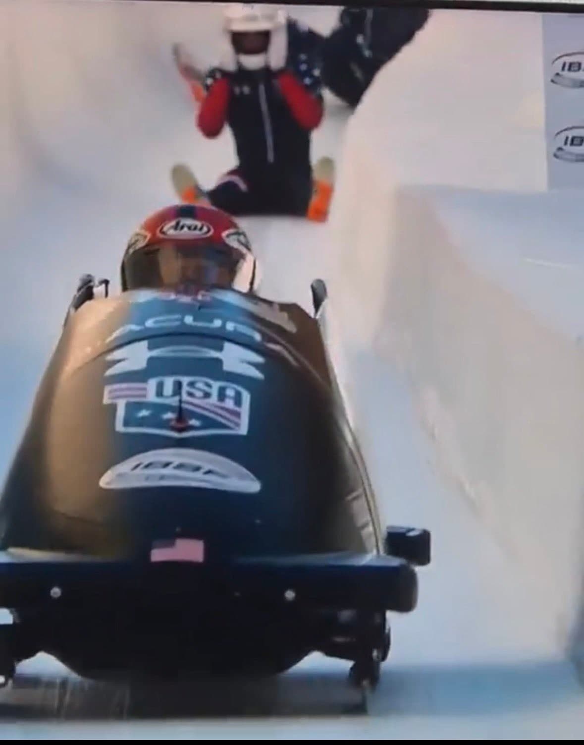 US bobsledder watching his sled from behind meme template