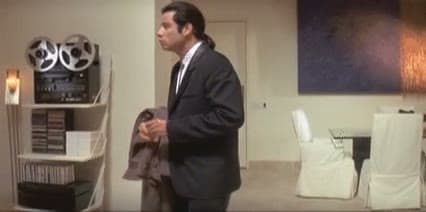 Confused John Travolta Looking Around