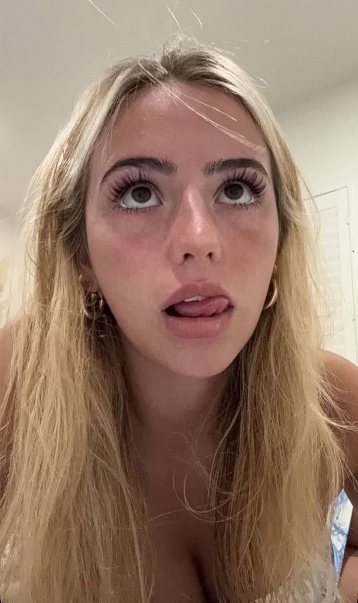 Woman with her tongue out how she looks at you