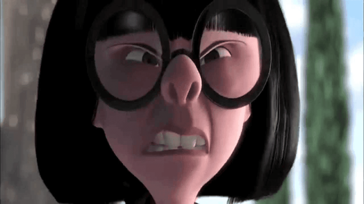Close-up animated image of Edna Mode from The Incredibles wearing oversized black glasses and grimacing skeptically while looking to the side.