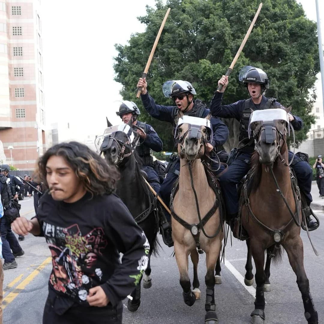 Man Running From Mounted Police