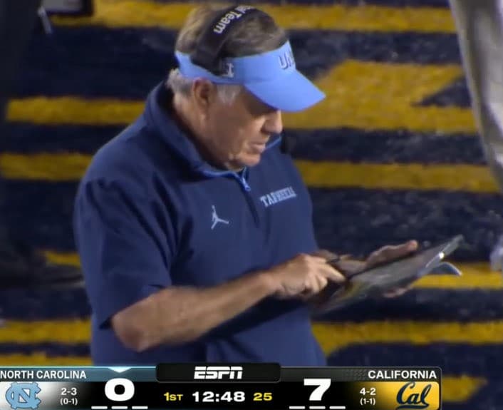 Bill Belichick Checking His Tablet