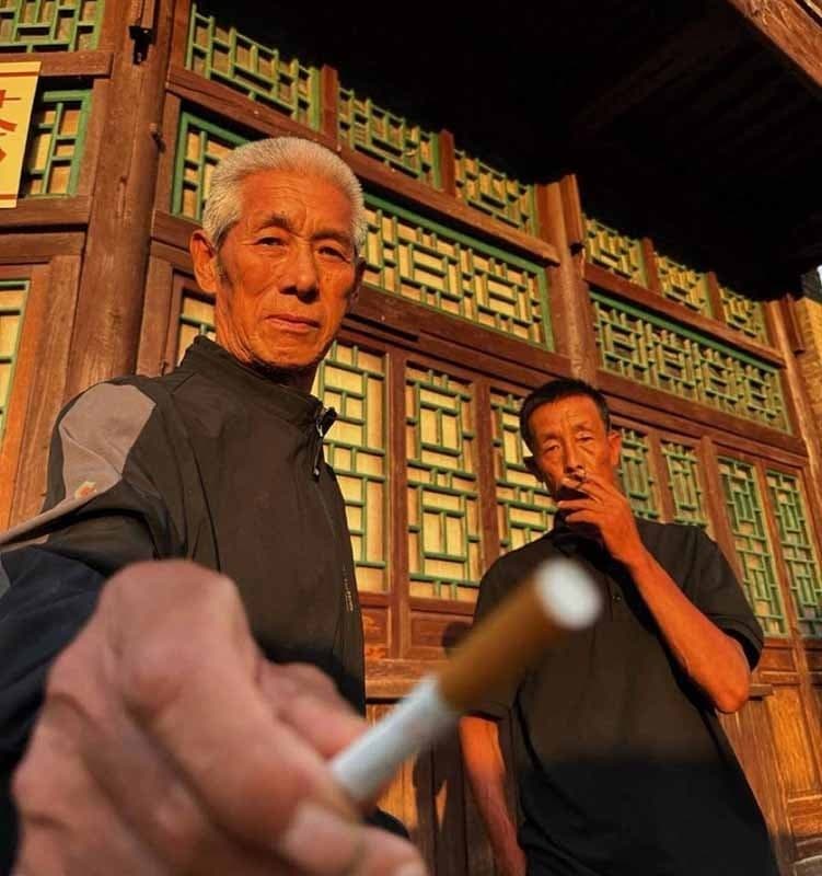 Chinese Man Offering X