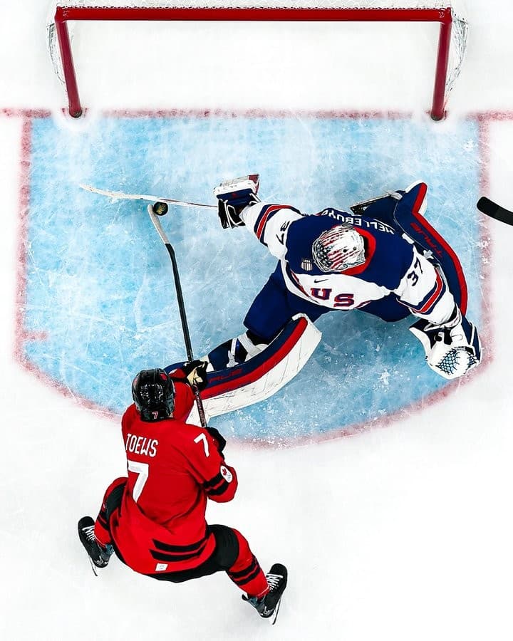 Connor Hellebuyck blocking a shot - Men's ice hockey gold medal game 2026 Winter Olympics