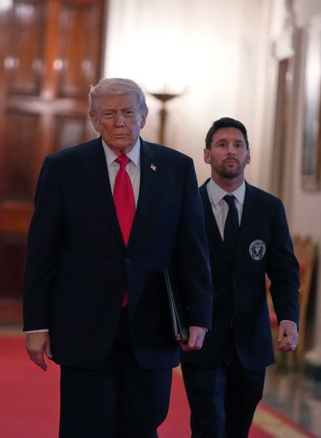 Donald Trump and Lionel Messi walking into the White house