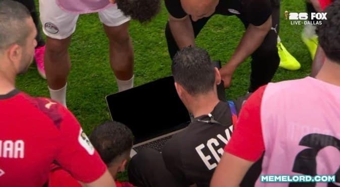 Egypt players on a laptop mid penalty (removed bg) meme template