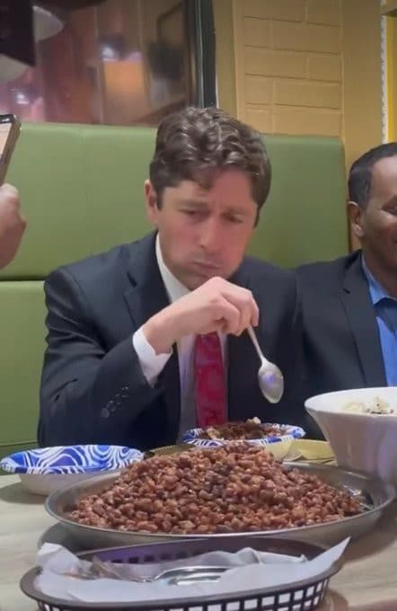 Gov Frey Struggling to Eat Somalian Food meme template