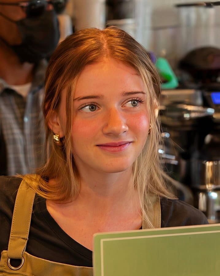 Israeli barista girl serving coffee to Netanyahu