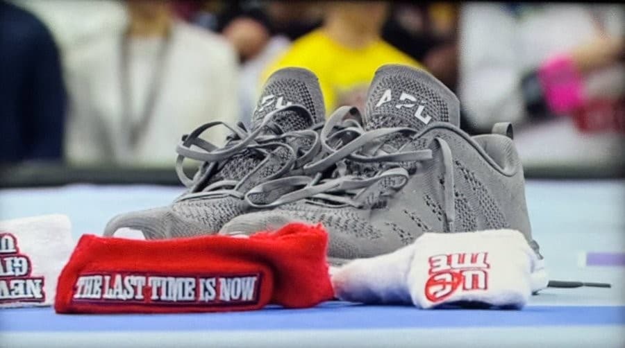 John Cena leaving the shoes in the center of the ring