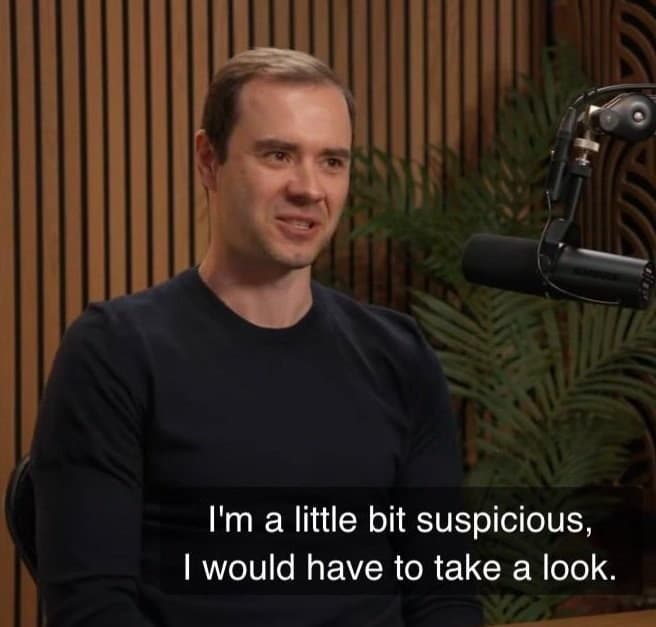 Karpathy suspicious meme template