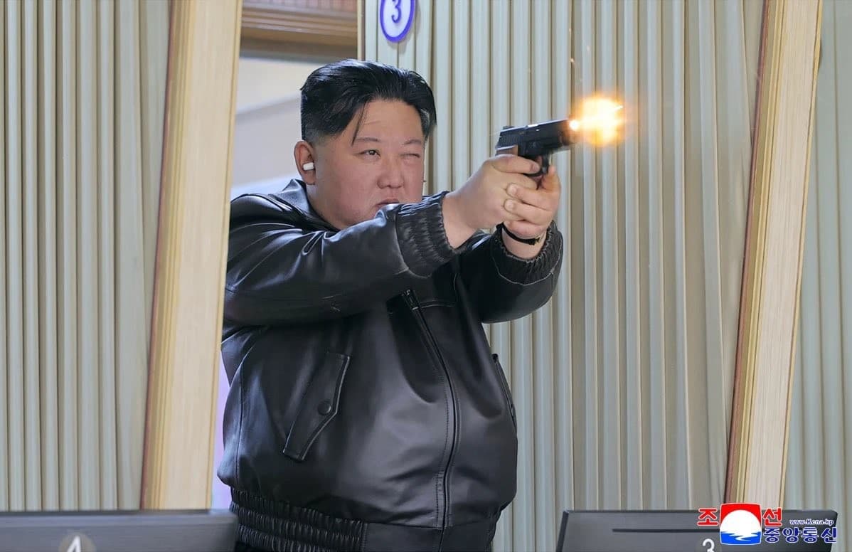 Kim Jong Un firing a pistol