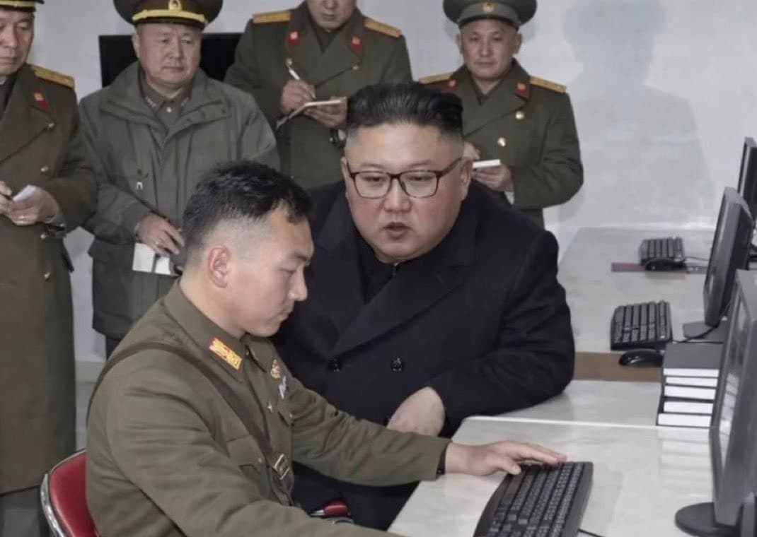 Kim Jong Un giving instructions to his army