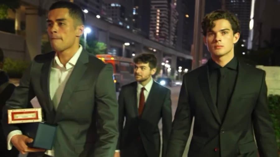 Nick Fuentes with Clavicular and Sneako walking in suits