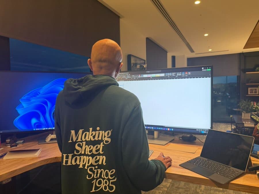 Satya Nadella working on Excel with a mouse
