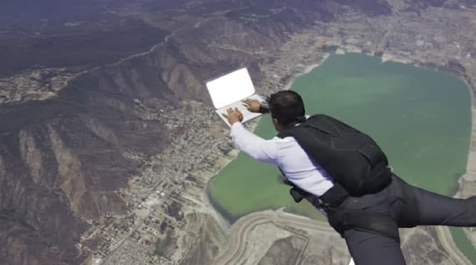 Skydiver working on Laptop (removed bg)