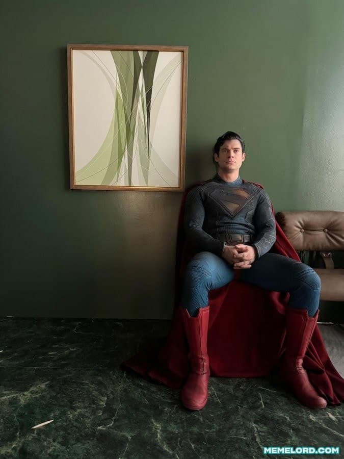 Superman sitting in a chair meme template