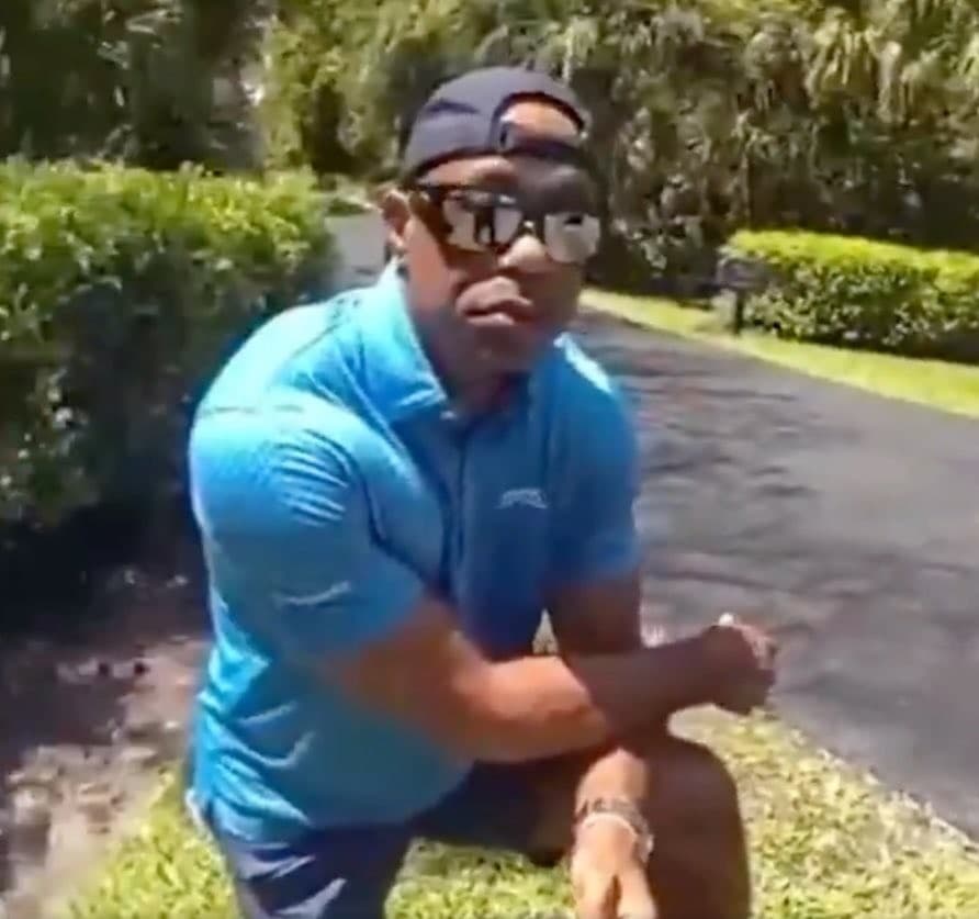 Tiger Woods kneeled in front of police officers after car accident