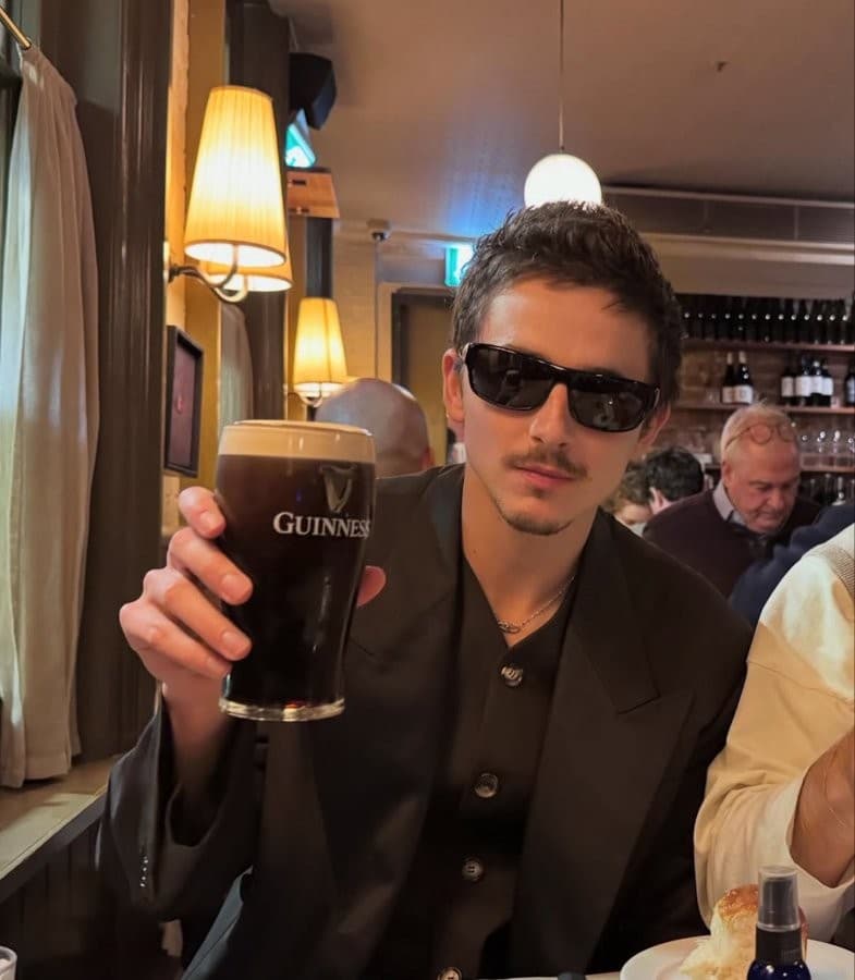 Timothée Chalamet enjoying a pint of Guinness