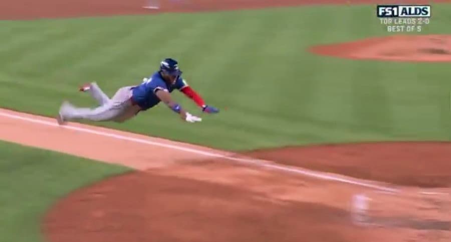 Vladimir Guerrero Jr. diving into home MLB