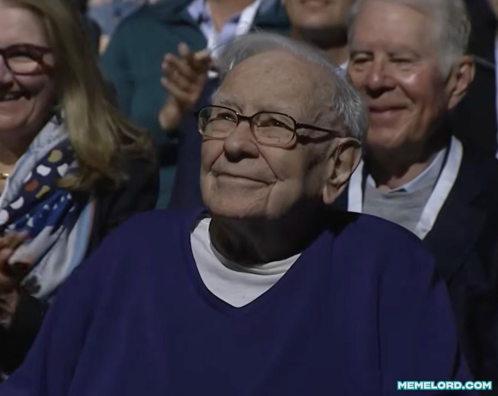 Warren Buffett smiling proudly / watching Berkshire Hathaway CEO speak at shareholder meeting meme template